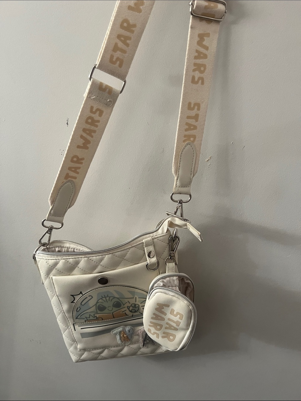 Cream Quilted Crossbody Bag with Character Graphic